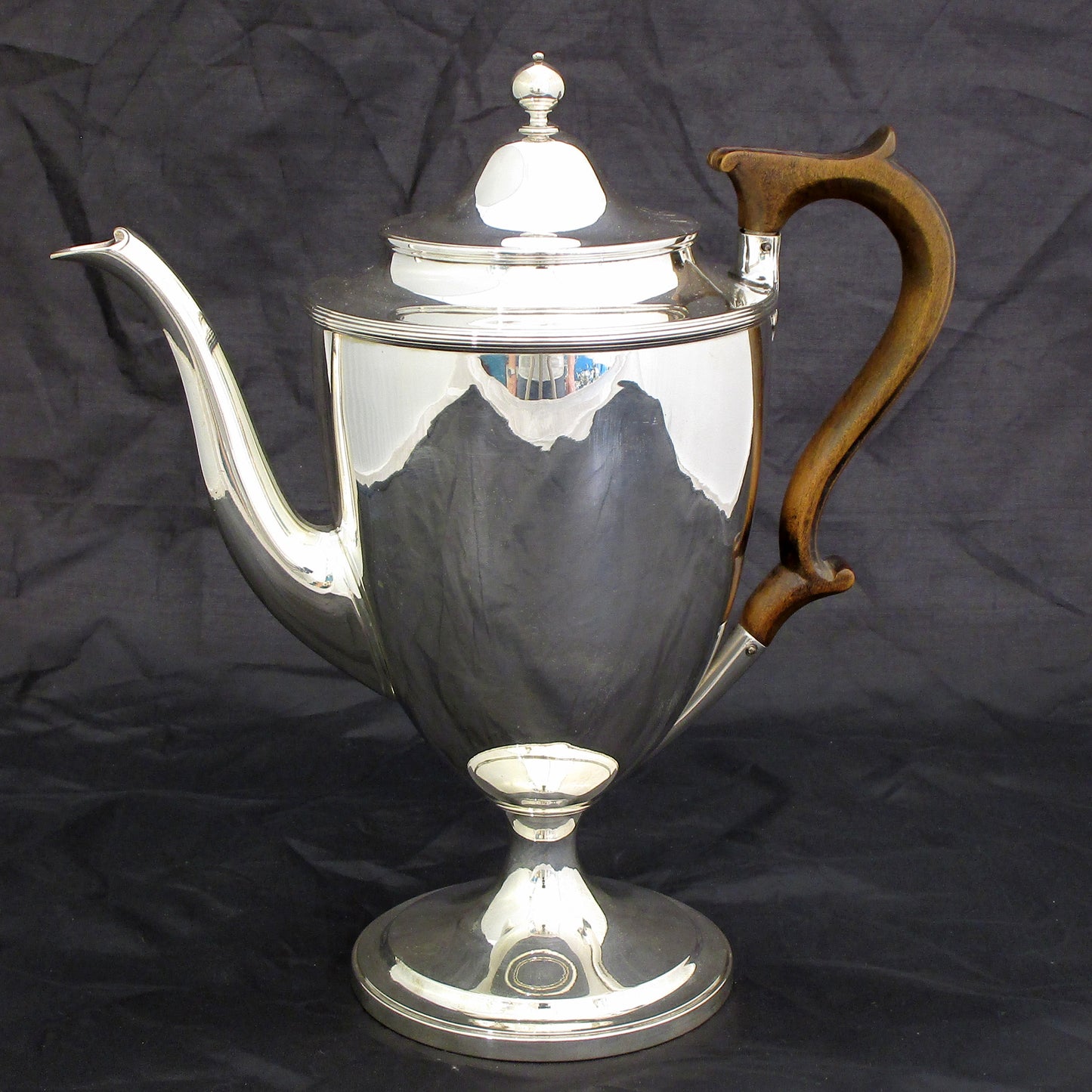 A Georgian sterling silver coffee pot