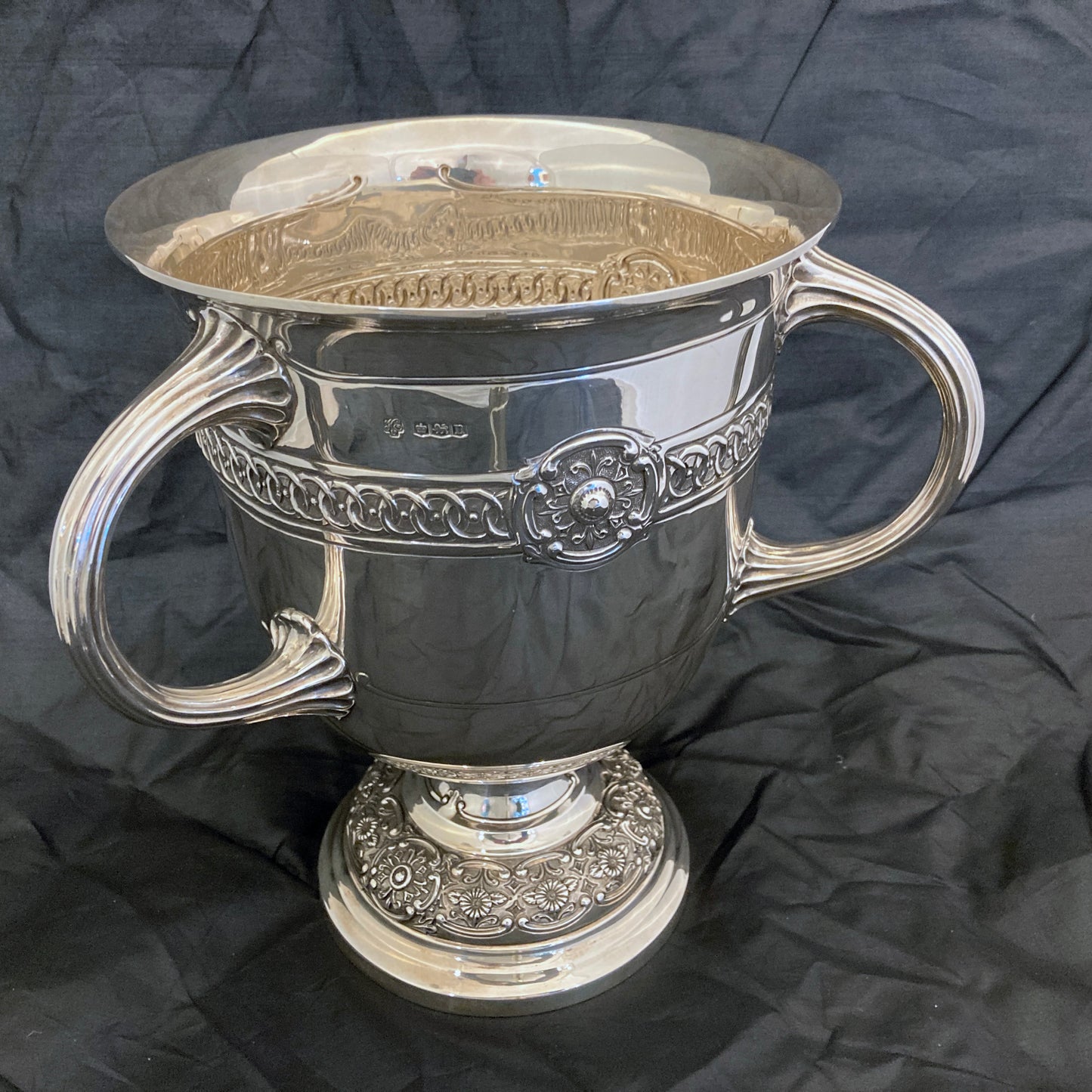 Sterling silver three handle trophy cup by Hanksworth, Eyre & Co