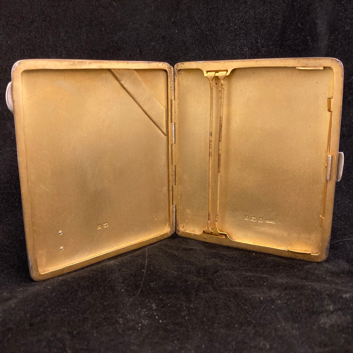Antique sterling cigarette case with Royal Artillery enamels.