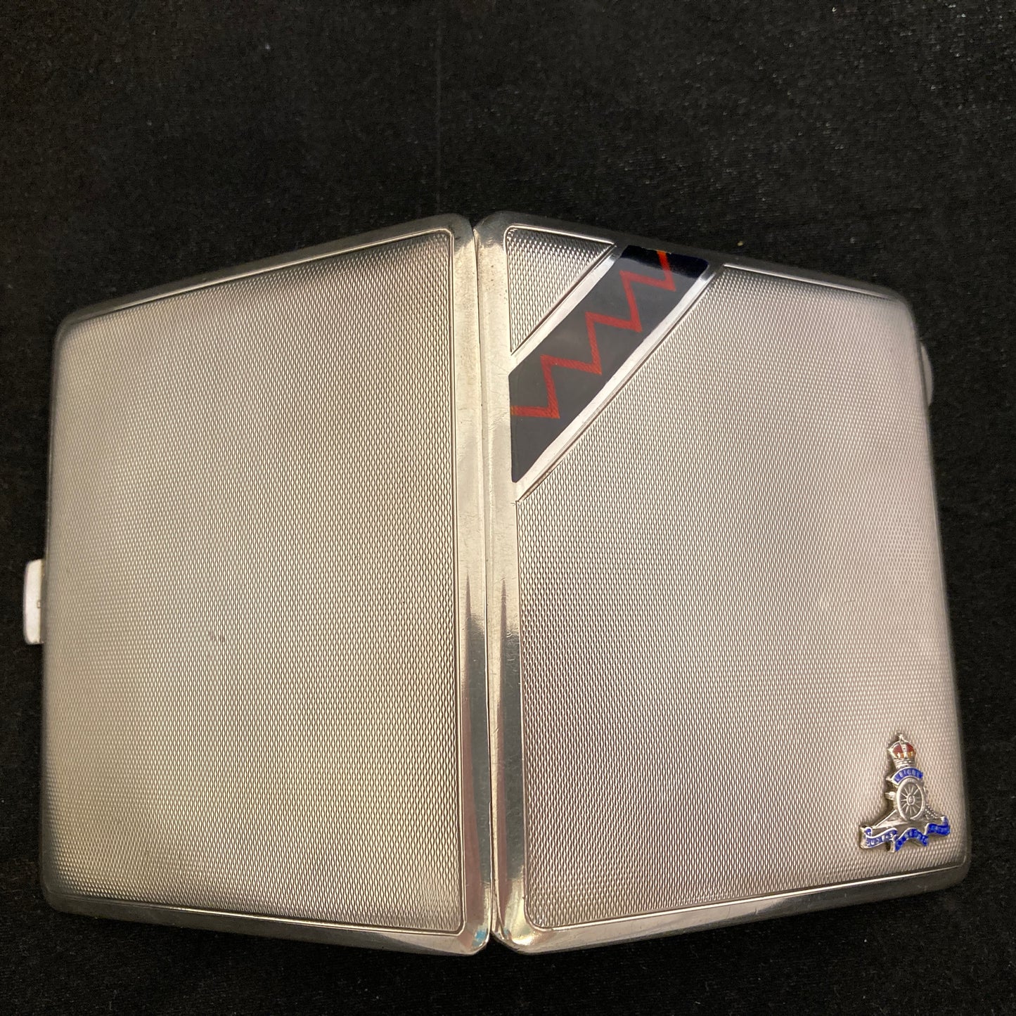 Antique sterling cigarette case with Royal Artillery enamels.