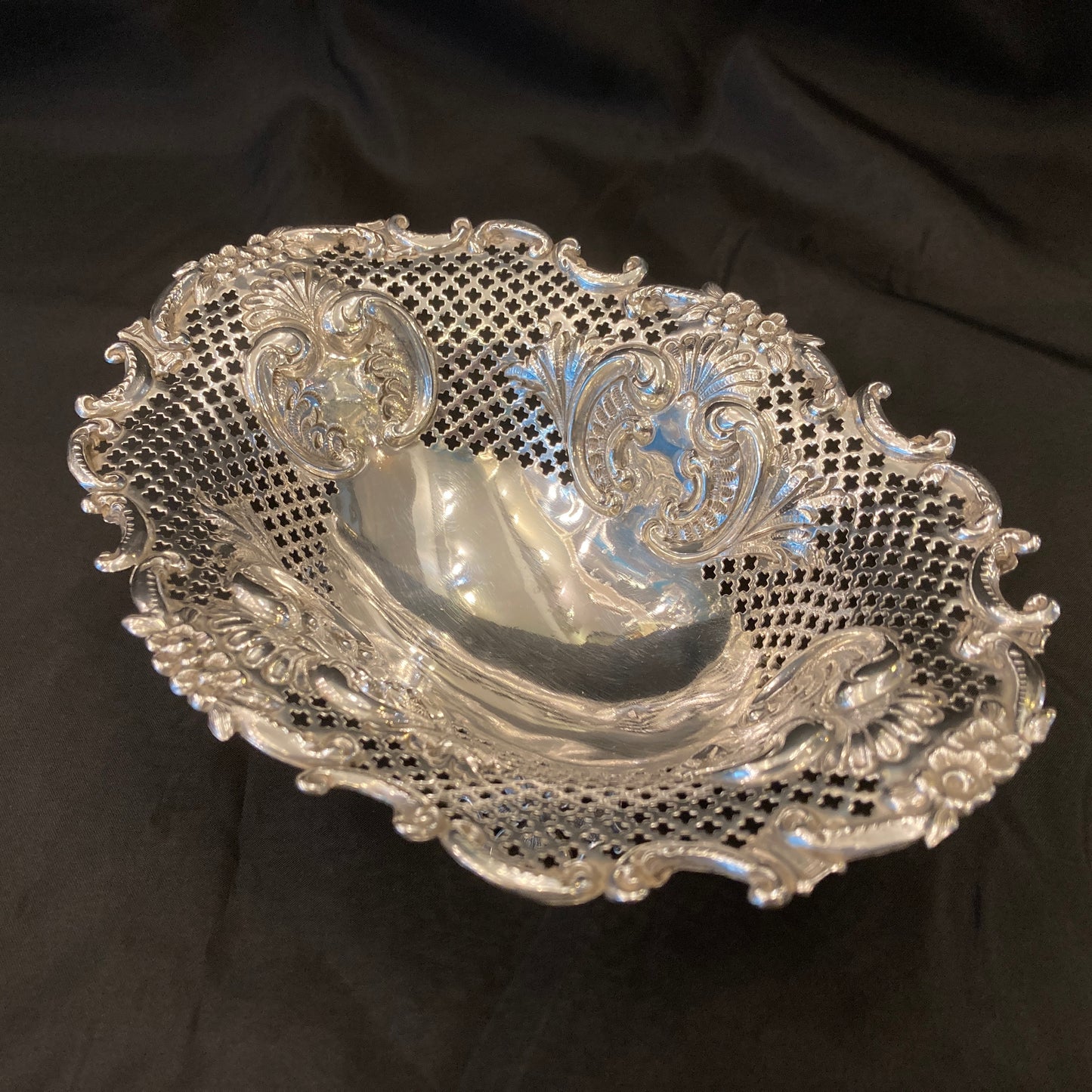 An Antique pair of pierced silver bonbon dishes