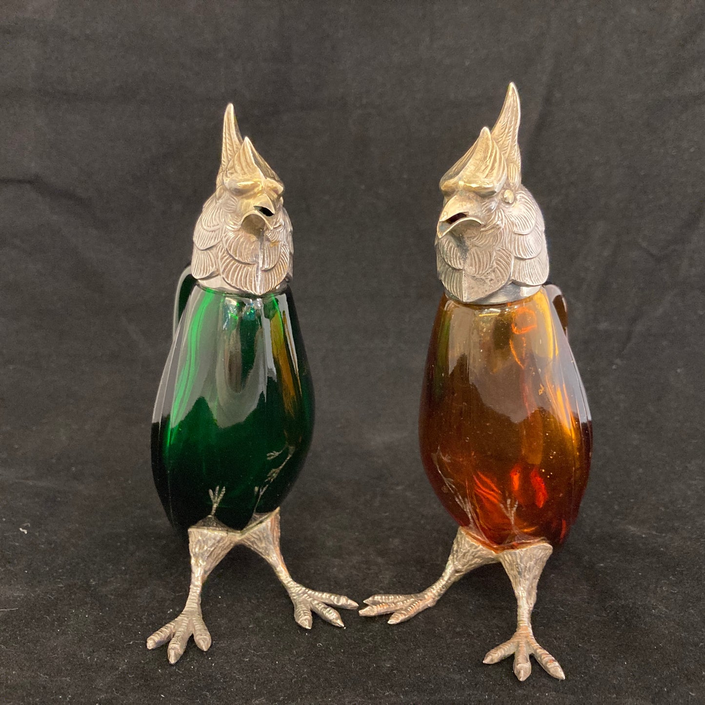 Pair of silver Whiskey noggins in the shape of cockatoos parrots