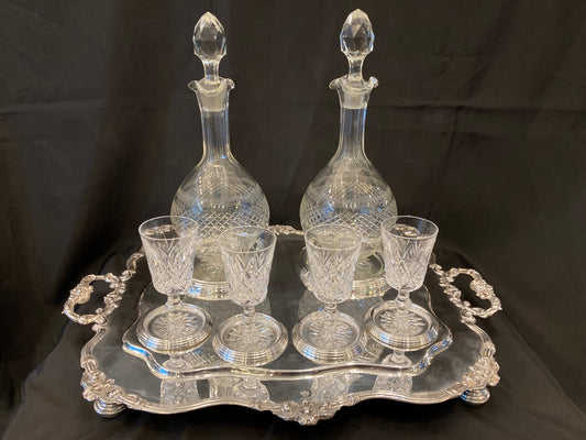 Antique silver plated drinks tray with cut crystal bottles and glasses