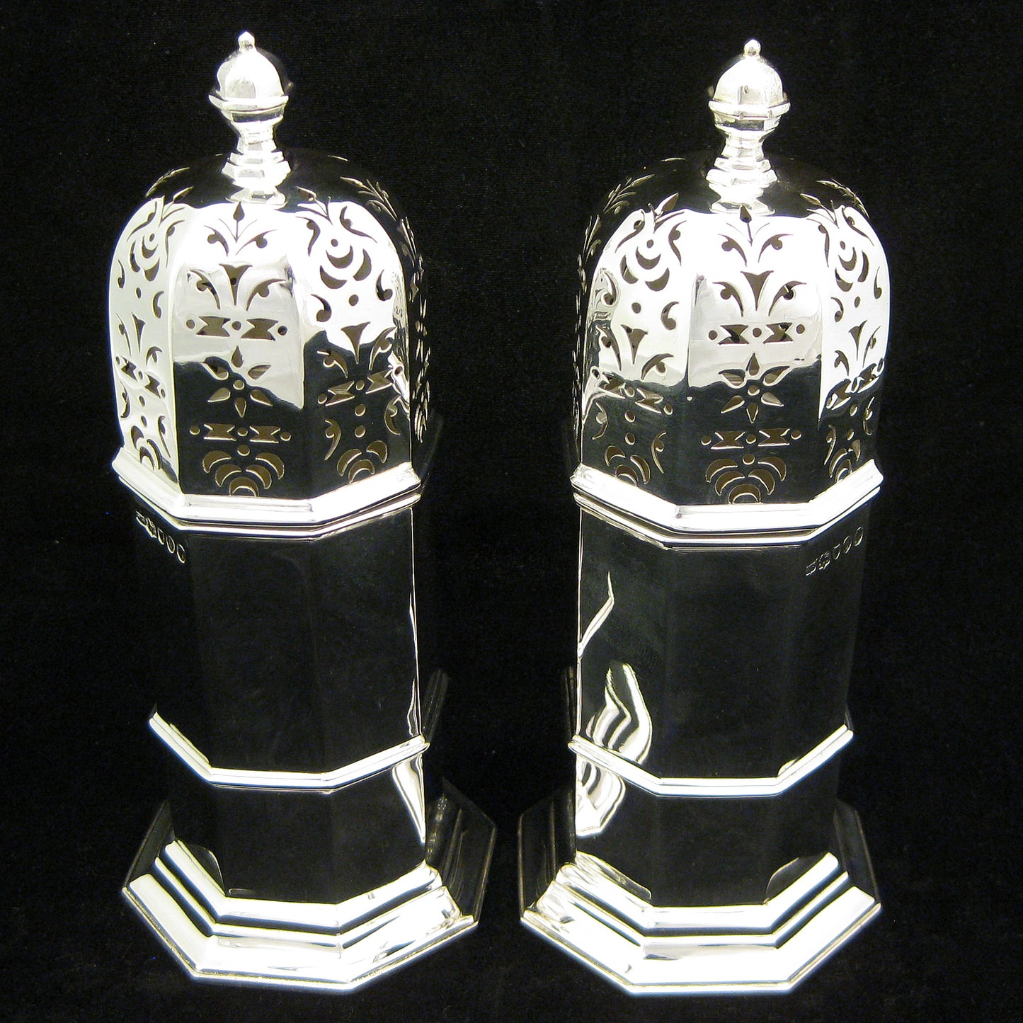A pair of sugar shakers by Samuel Walton Smith.
