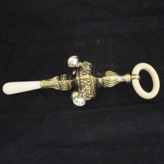 A gilt sterling silver baby rattle.