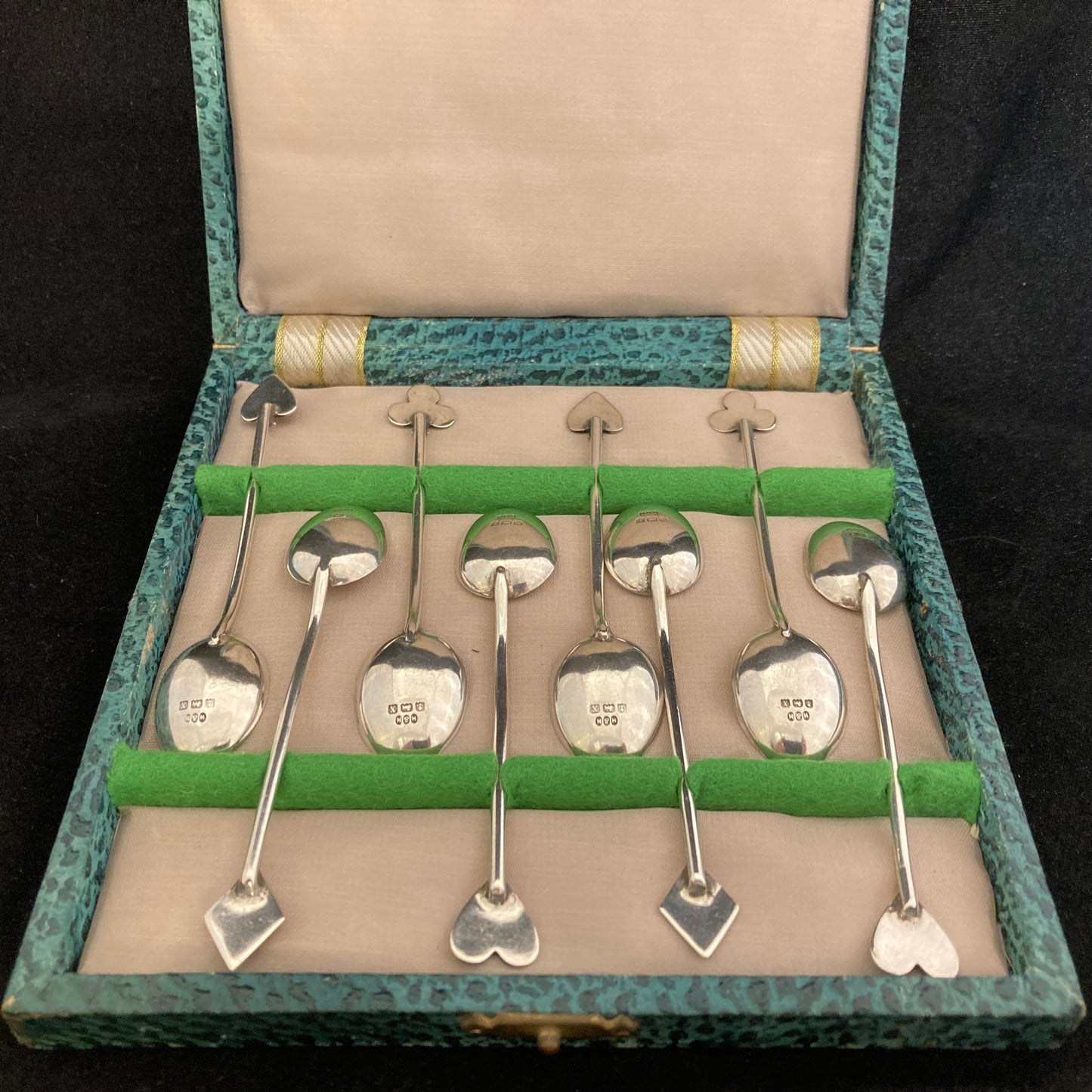 Boxed set of 8 silver and enamel spoons with Playing card symbols