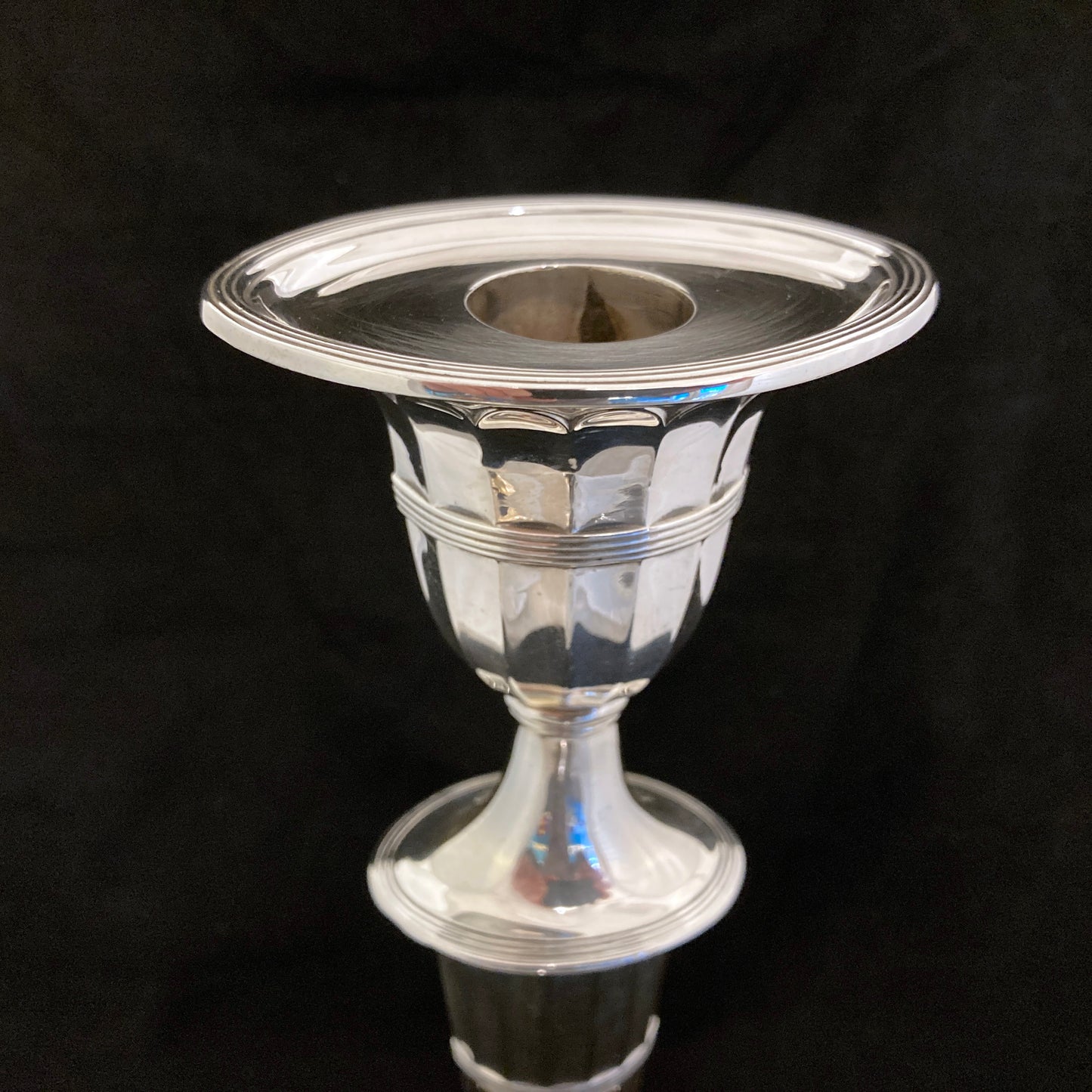 A pair of sterling silver candle sticks By Hanksworth & Eyre