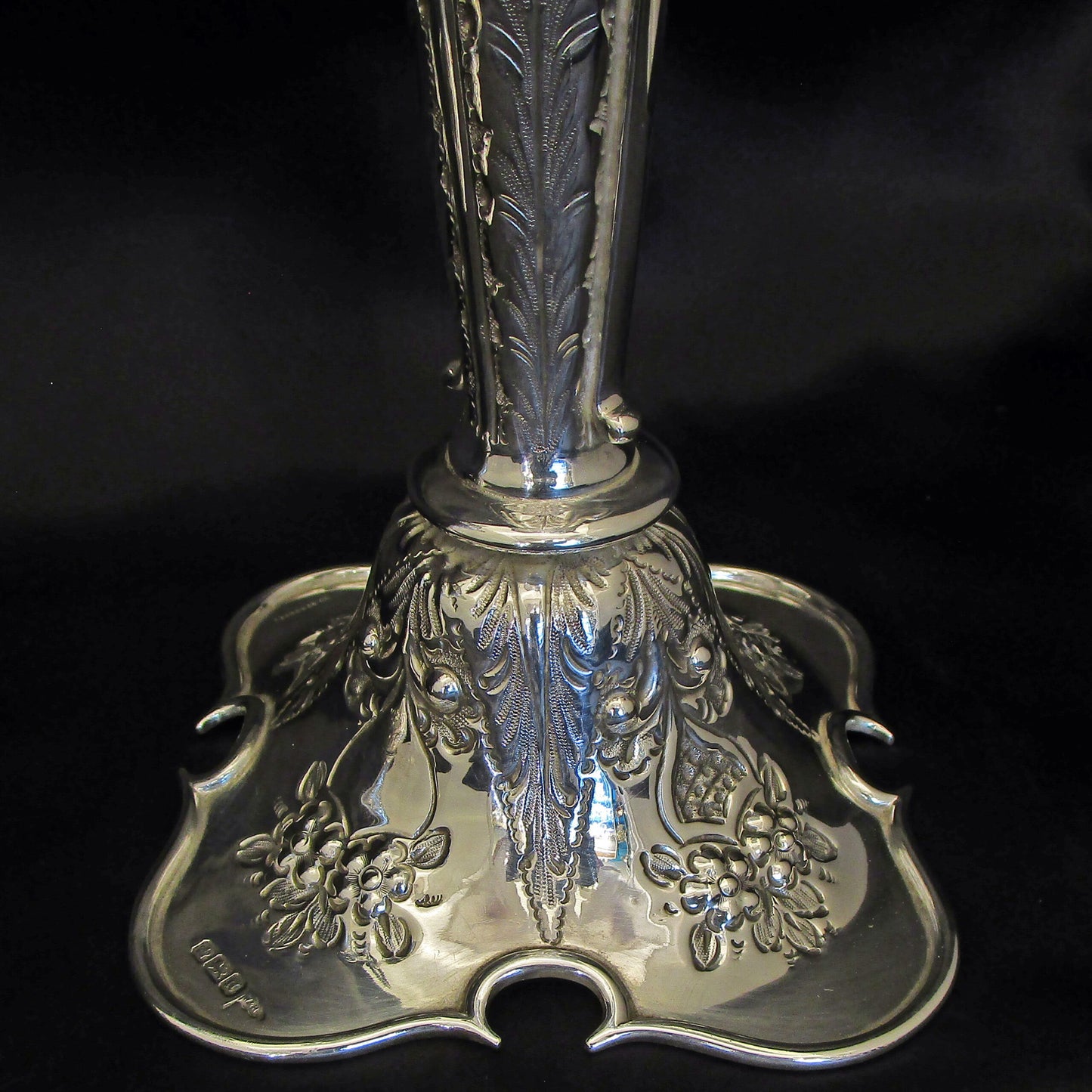 A pair of large sterling silver pierced and embossed vases by Walker & Hall.