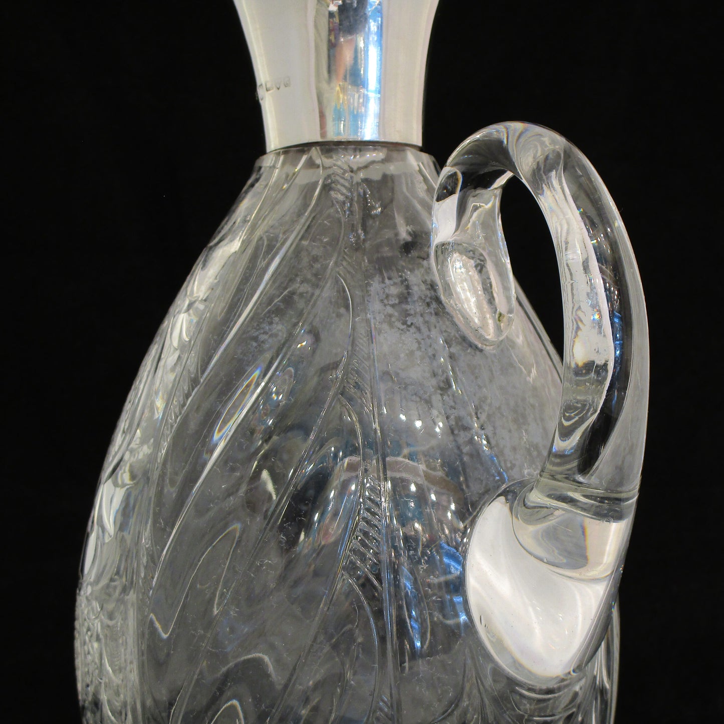 Silver rimmed claret jug by James Deaking & sons