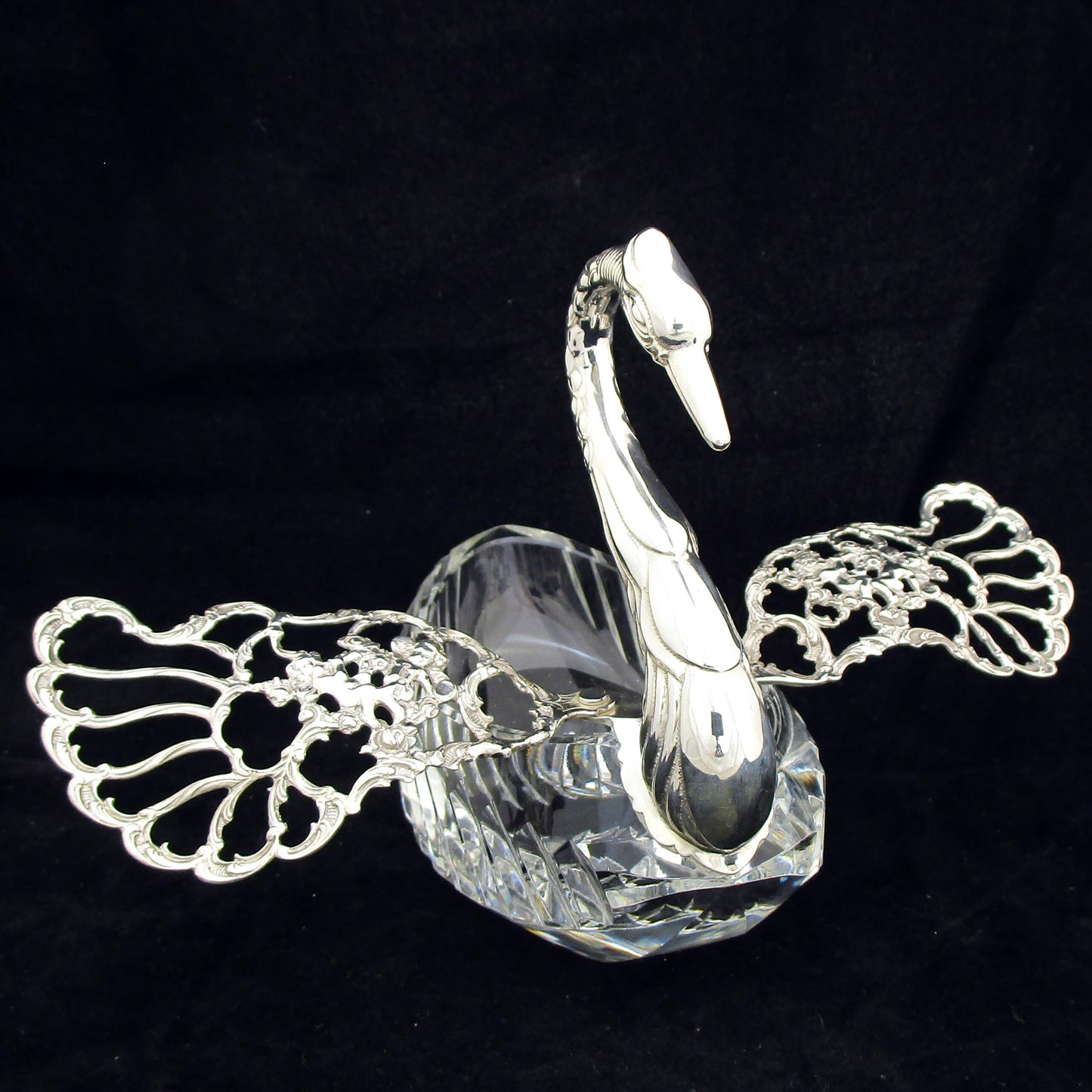 silver and cut crystal swan.