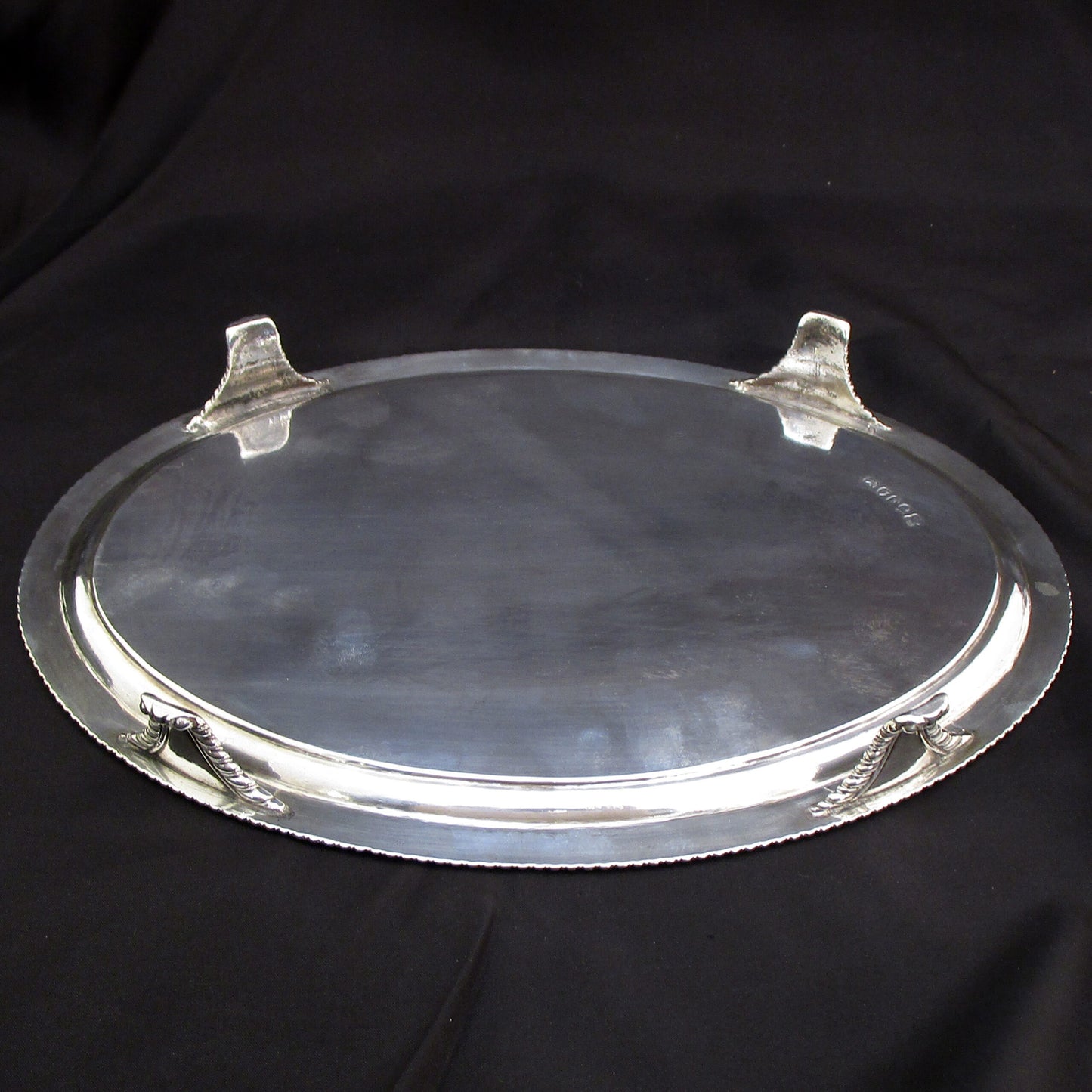 A Georgian oval gadrooned border sterling silver salva / drinks tray.