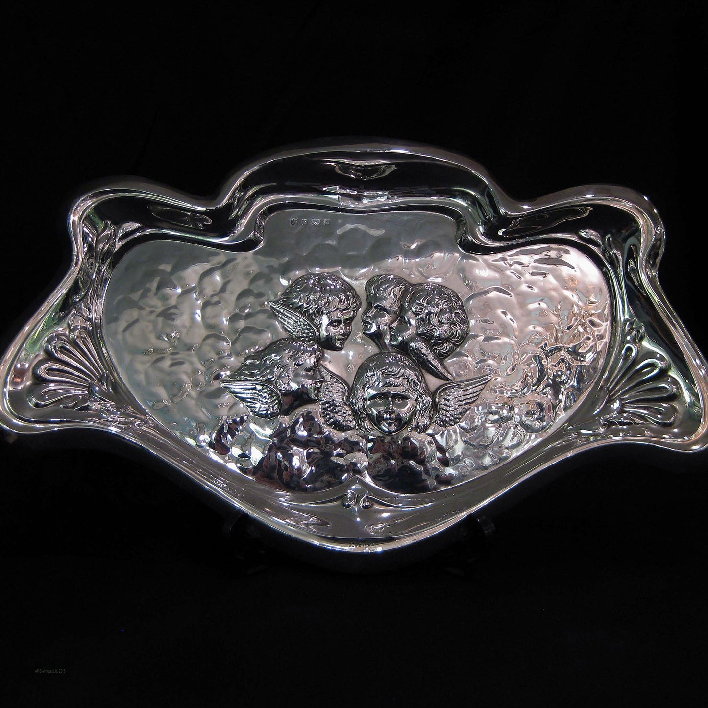 A sterling silver Reynolds Angels letter tray.