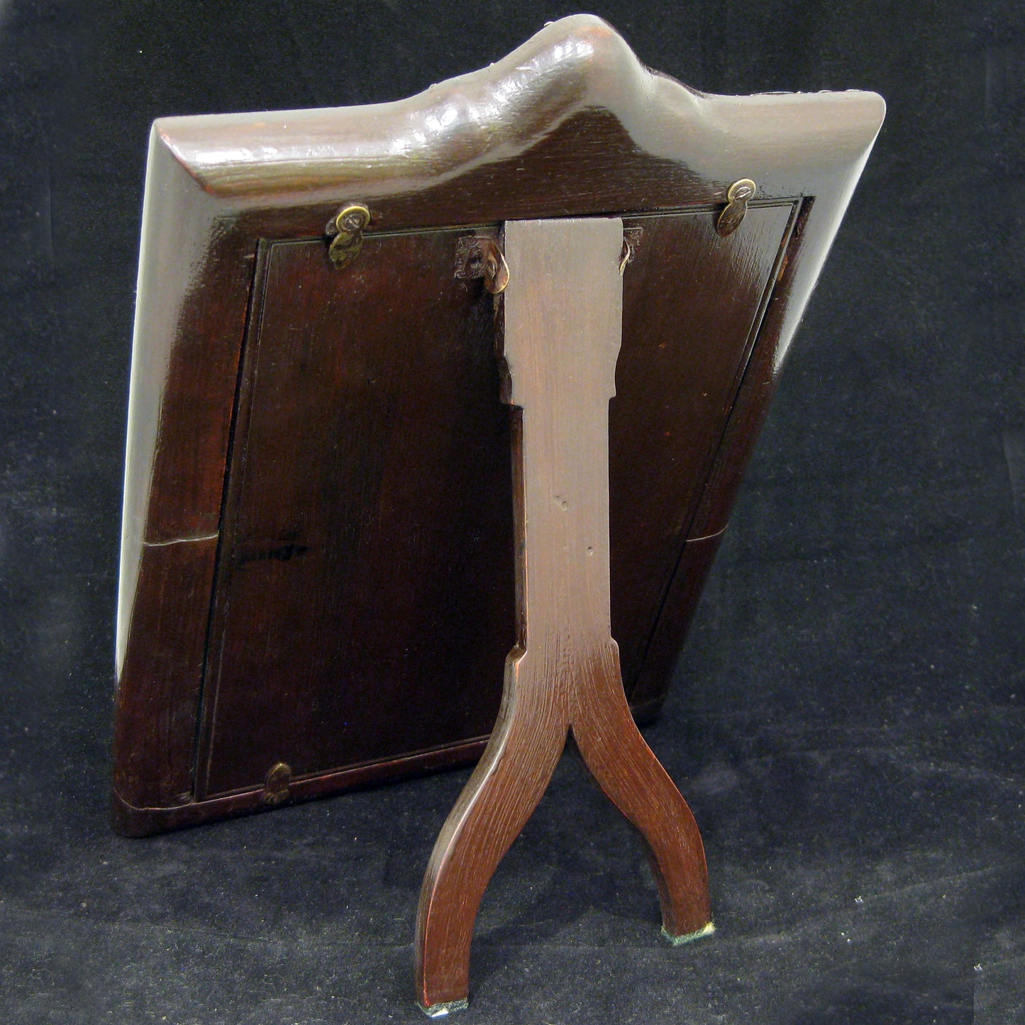 Sterling silver ornate table mirror/picture frame.