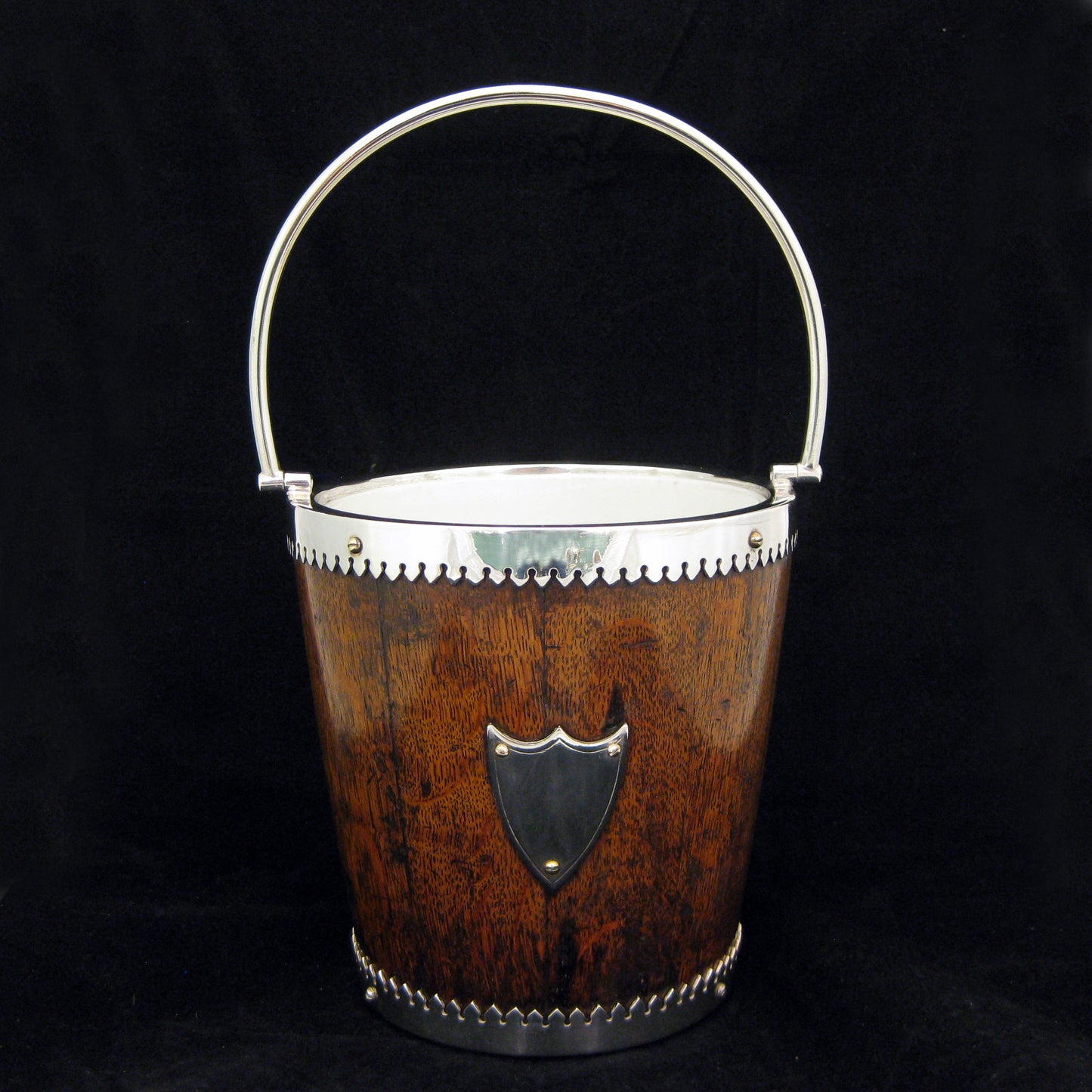A mahogany ice bucket -cooler