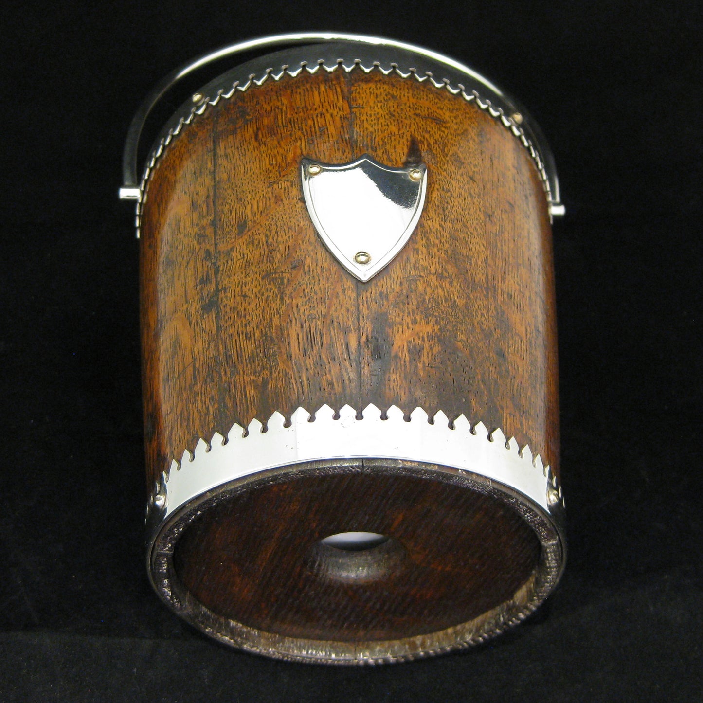 A mahogany ice bucket -cooler