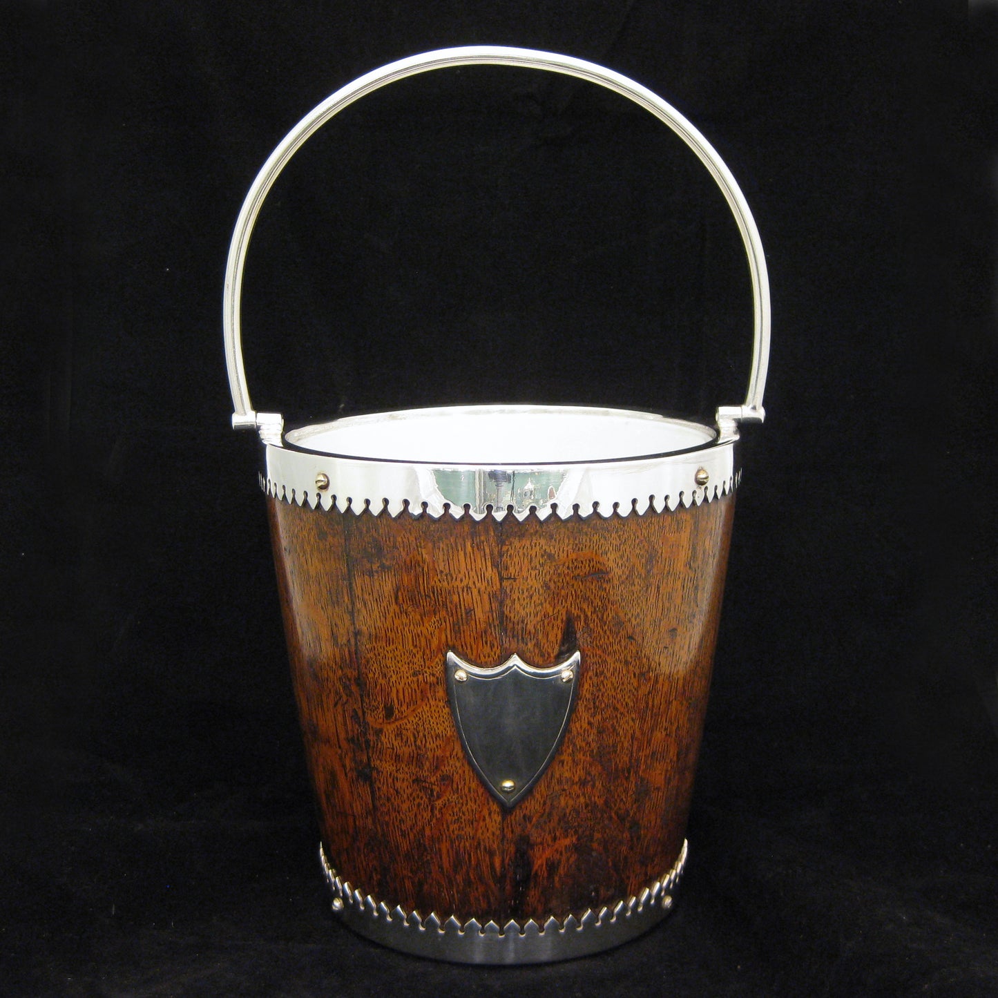 A mahogany ice bucket -cooler