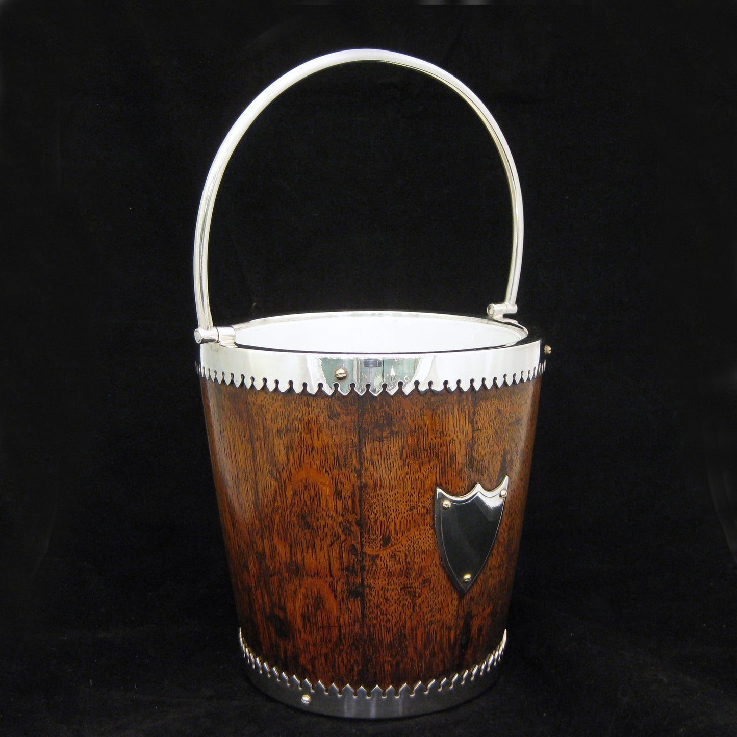 A mahogany ice bucket -cooler