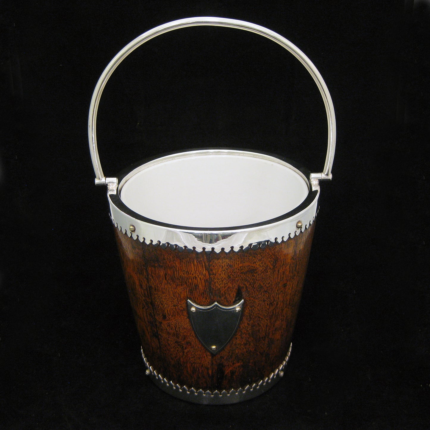 A mahogany ice bucket -cooler