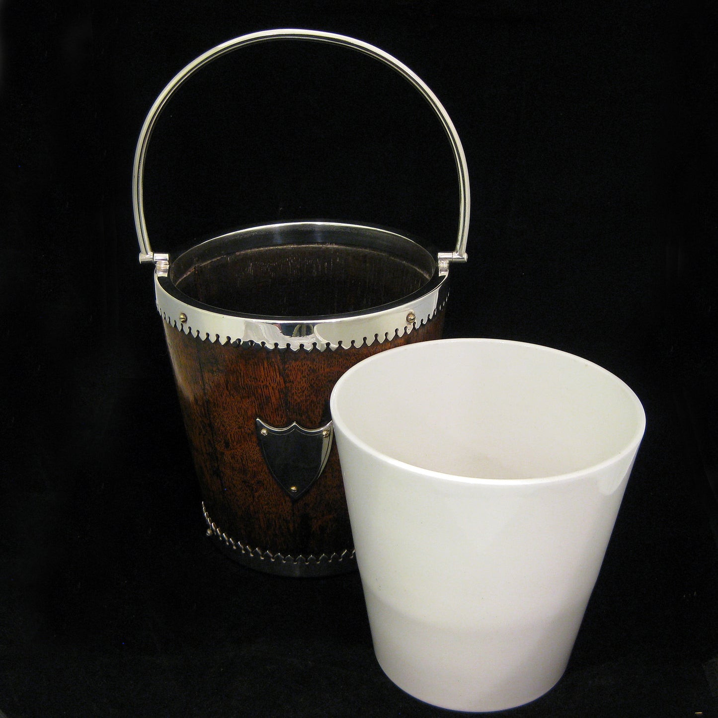 A mahogany ice bucket -cooler