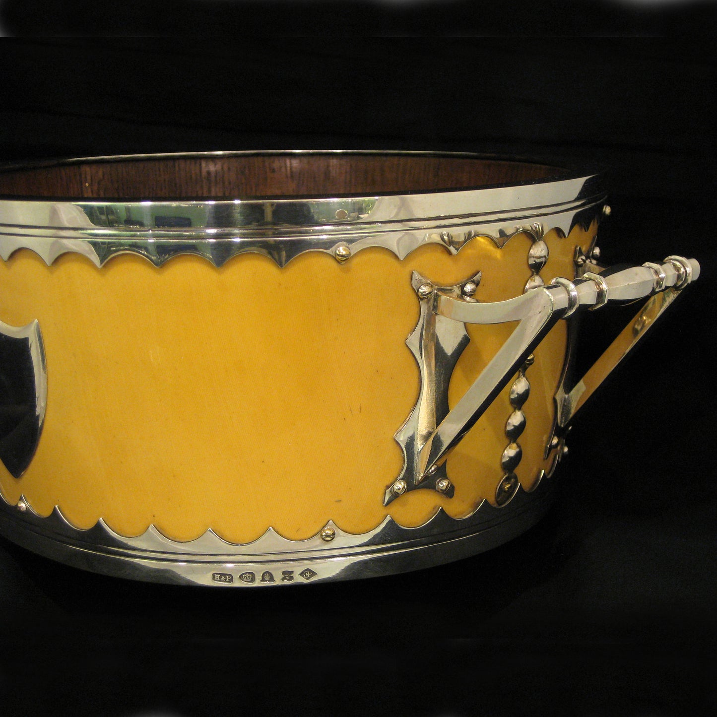 A impressive and unique salad bowl with servers.