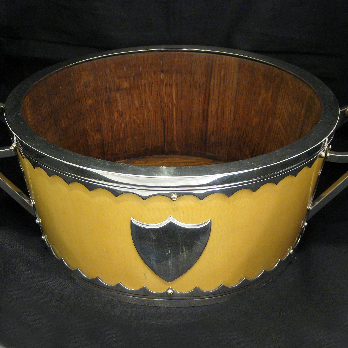 A impressive and unique salad bowl with servers.