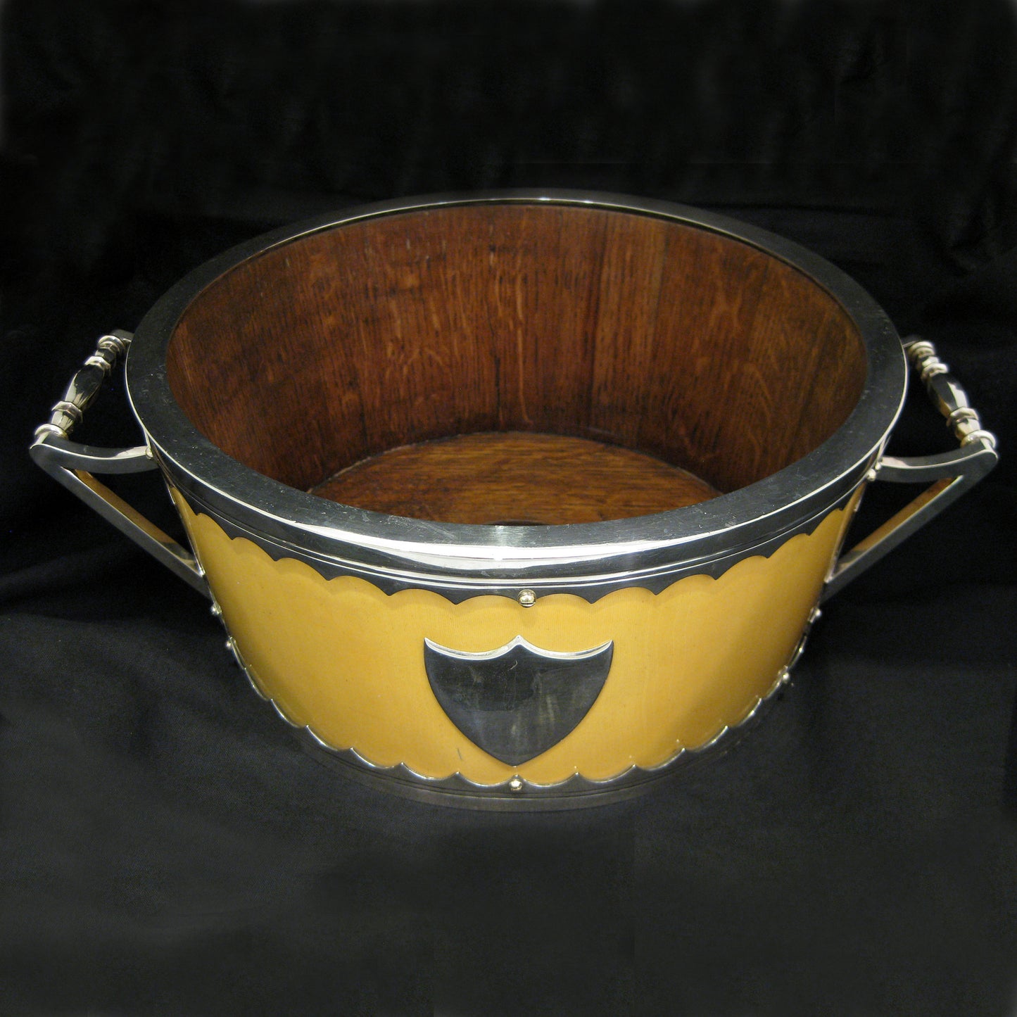 A impressive and unique salad bowl with servers.