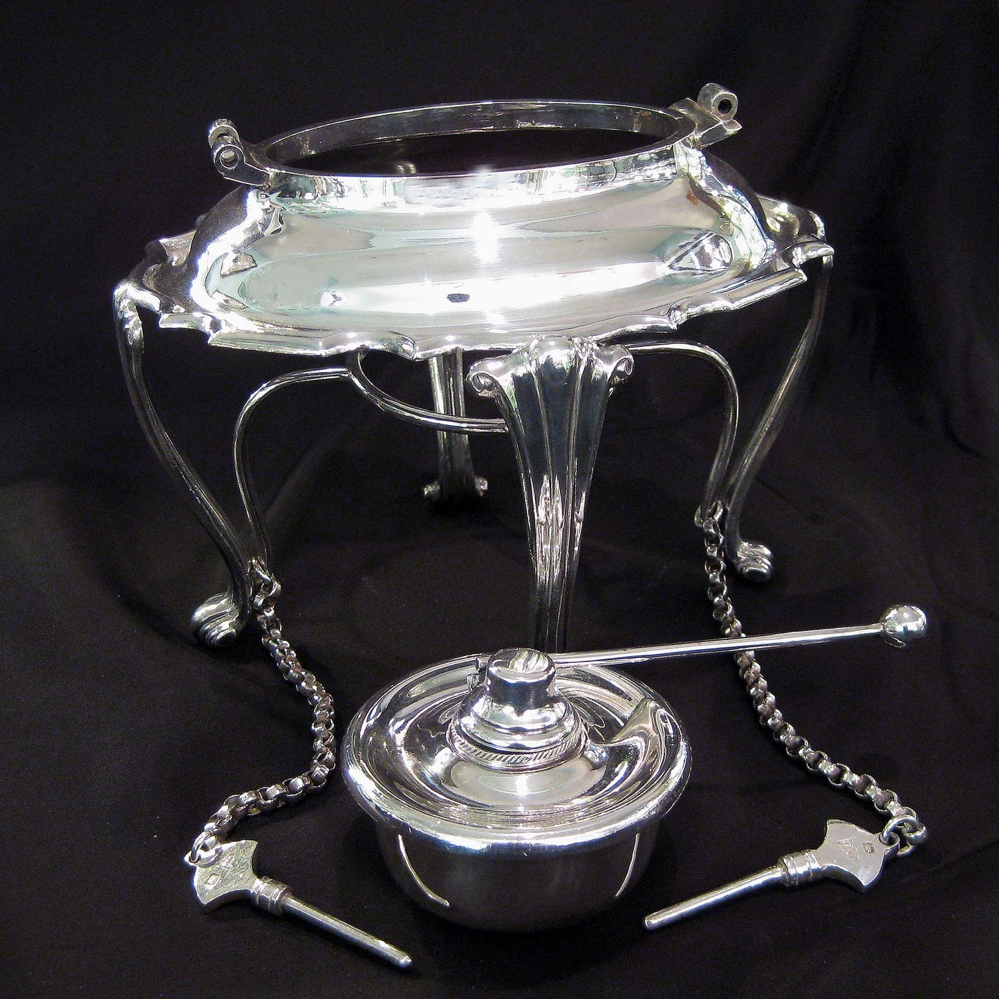 Silver kettle on stand by Walker & Hall