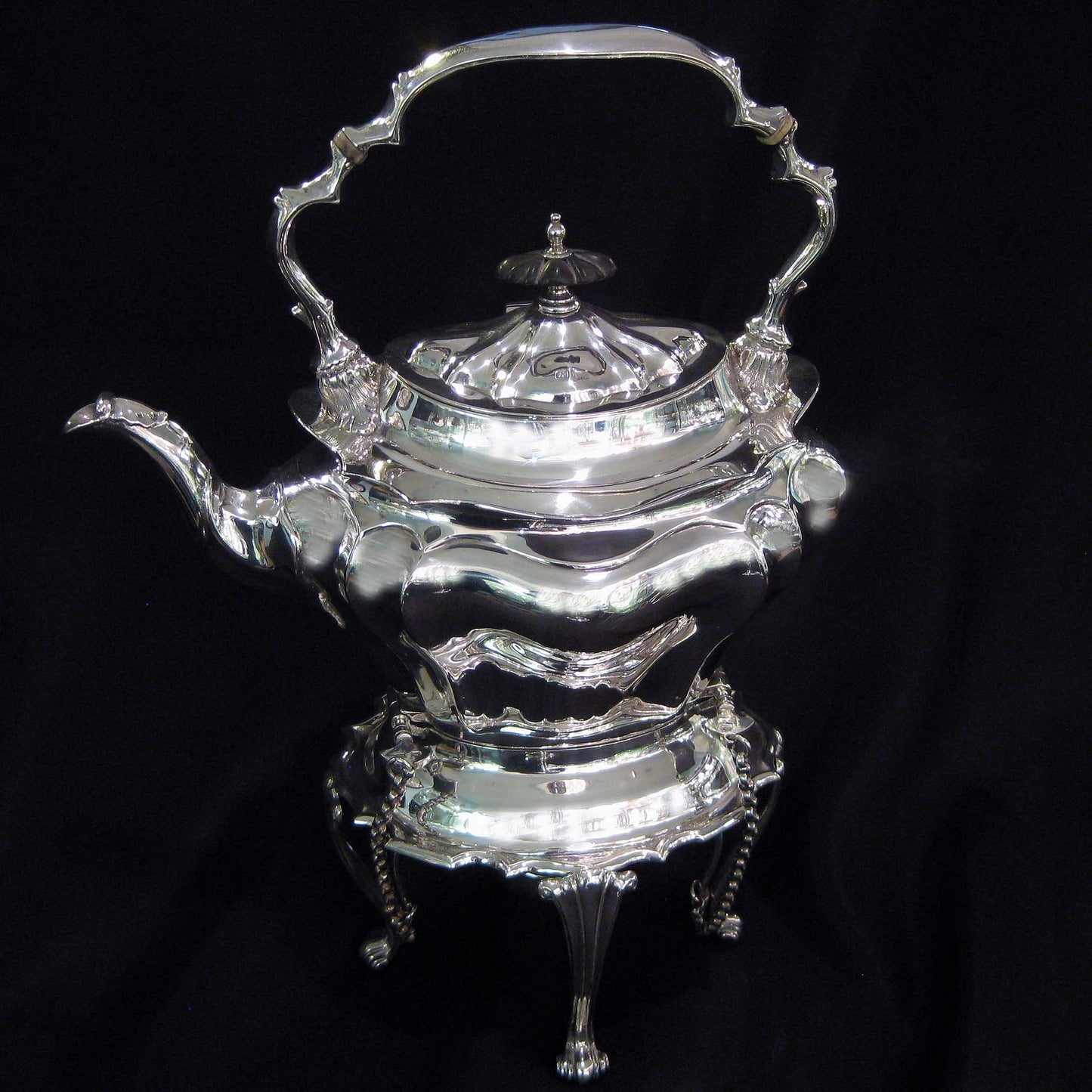 Silver kettle on stand by Walker & Hall