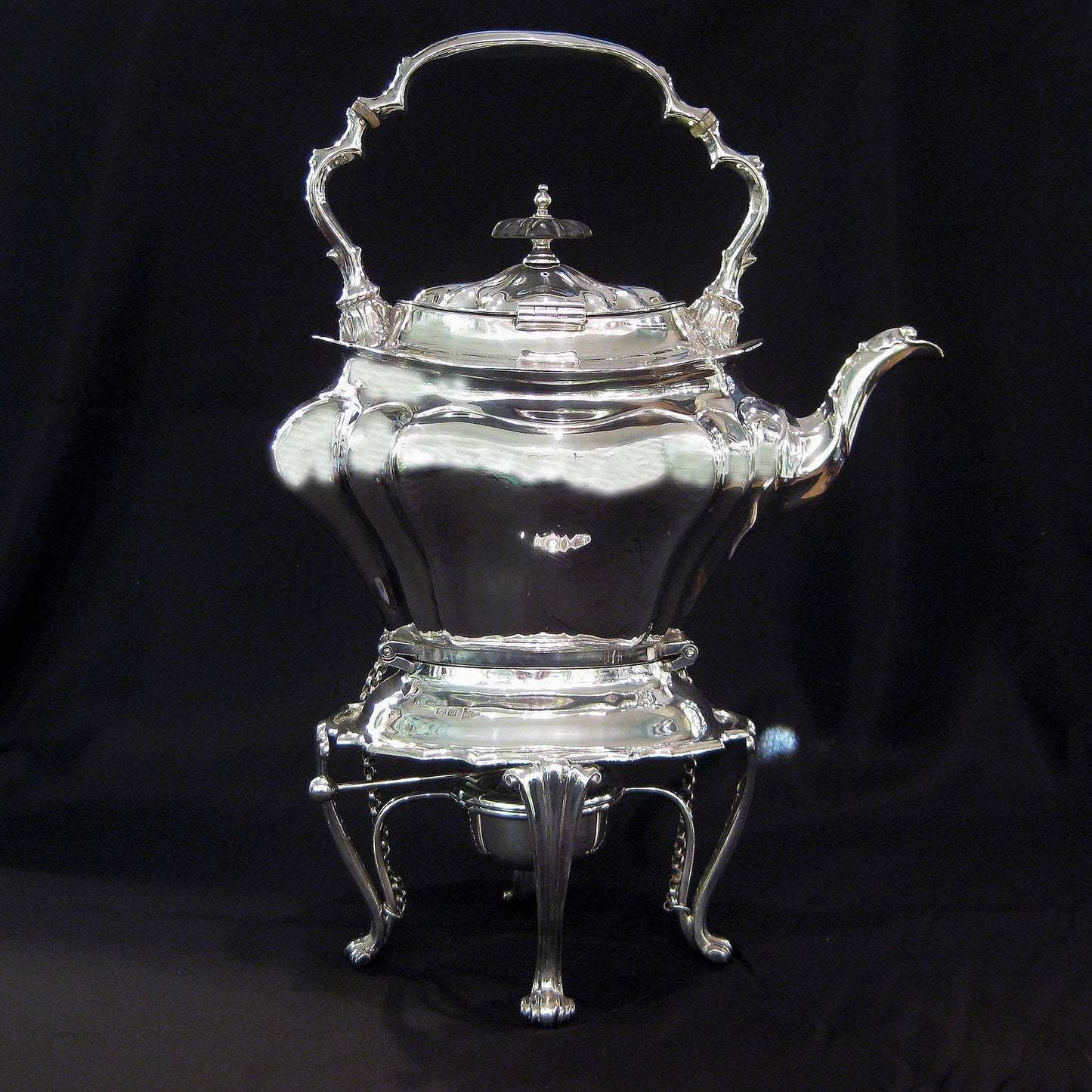 Silver kettle on stand by Walker & Hall