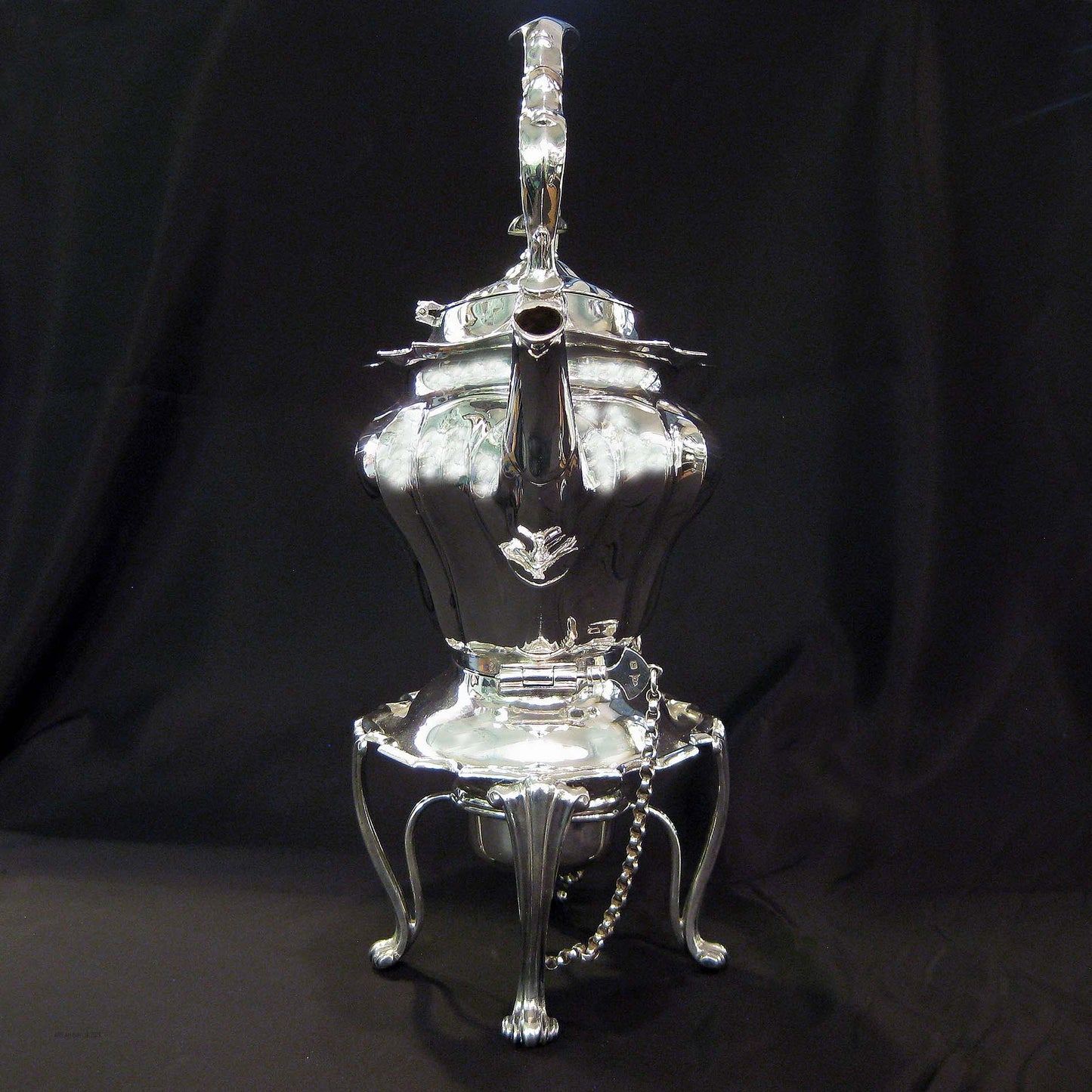 Silver kettle on stand by Walker & Hall
