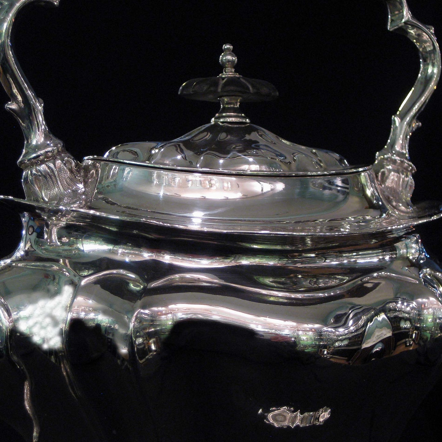 Silver kettle on stand by Walker & Hall