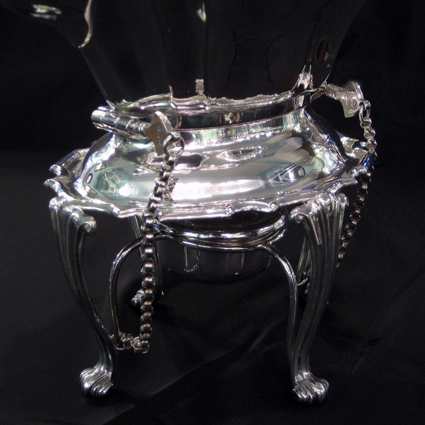 Silver kettle on stand by Walker & Hall