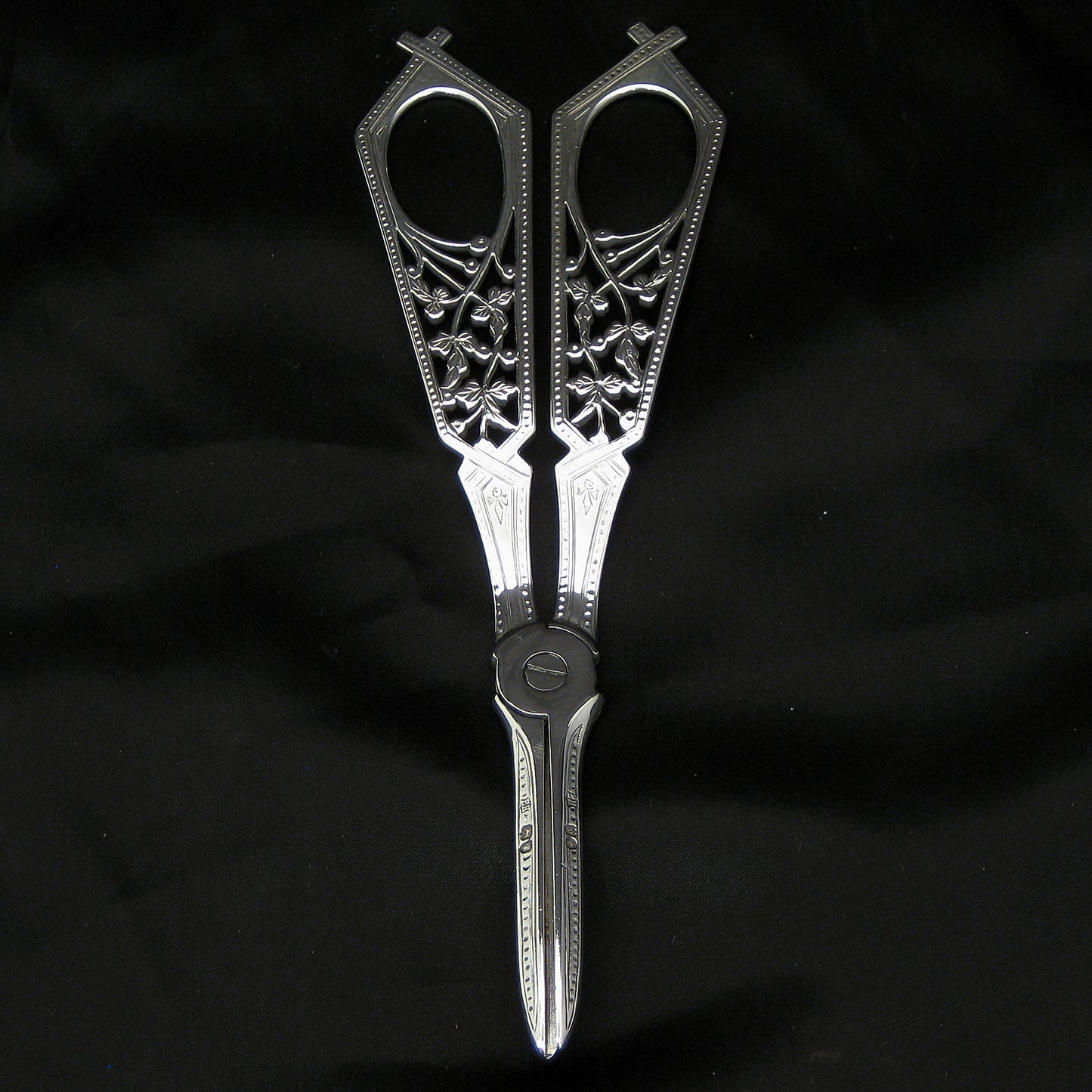 Silver grape scissors by William Hutton & sons