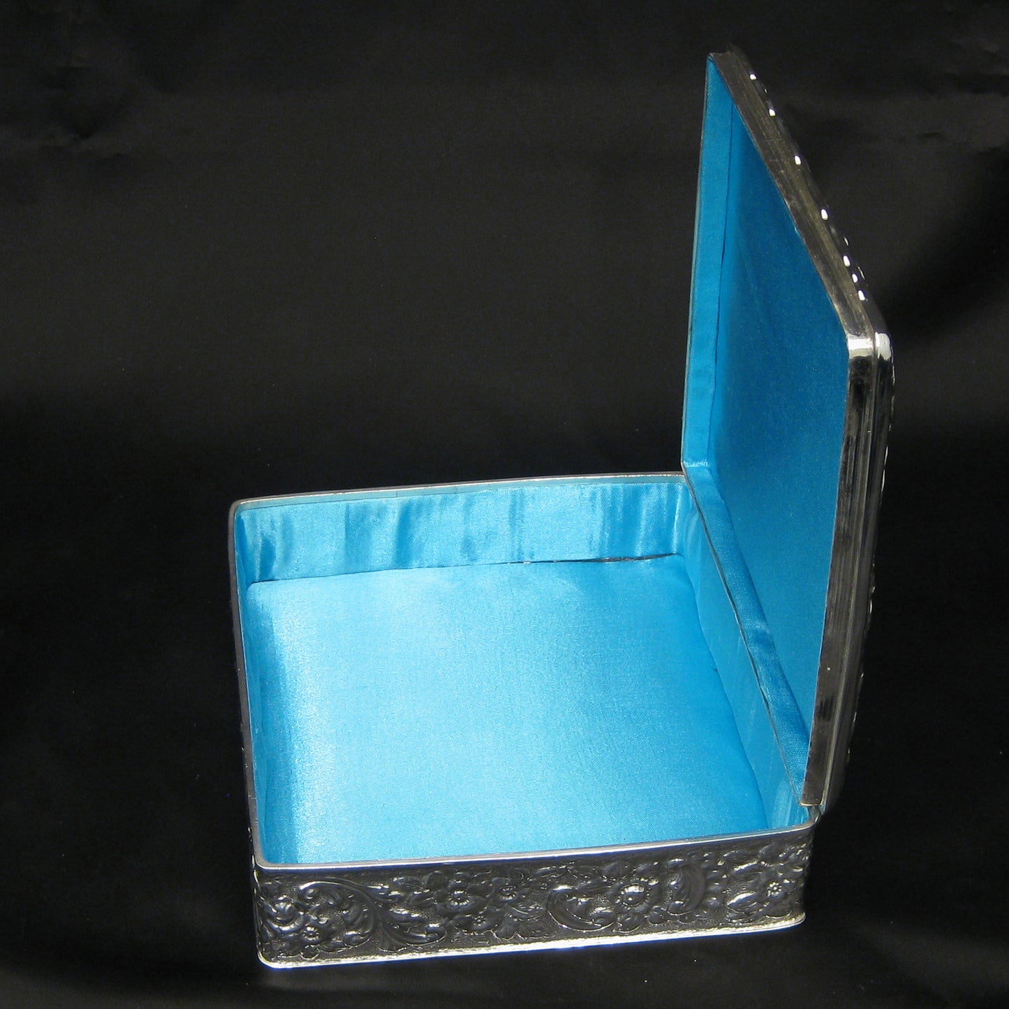 Wonderful quality chased silver jewellery box.