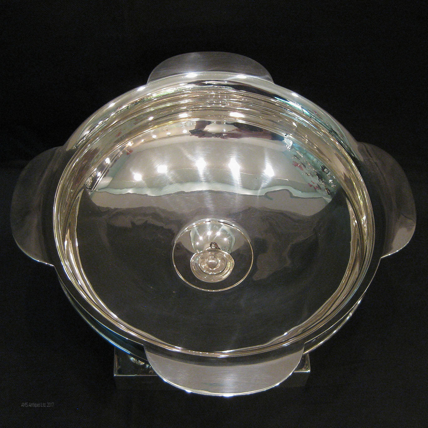 Silver Bowl with sturgeons on base.
