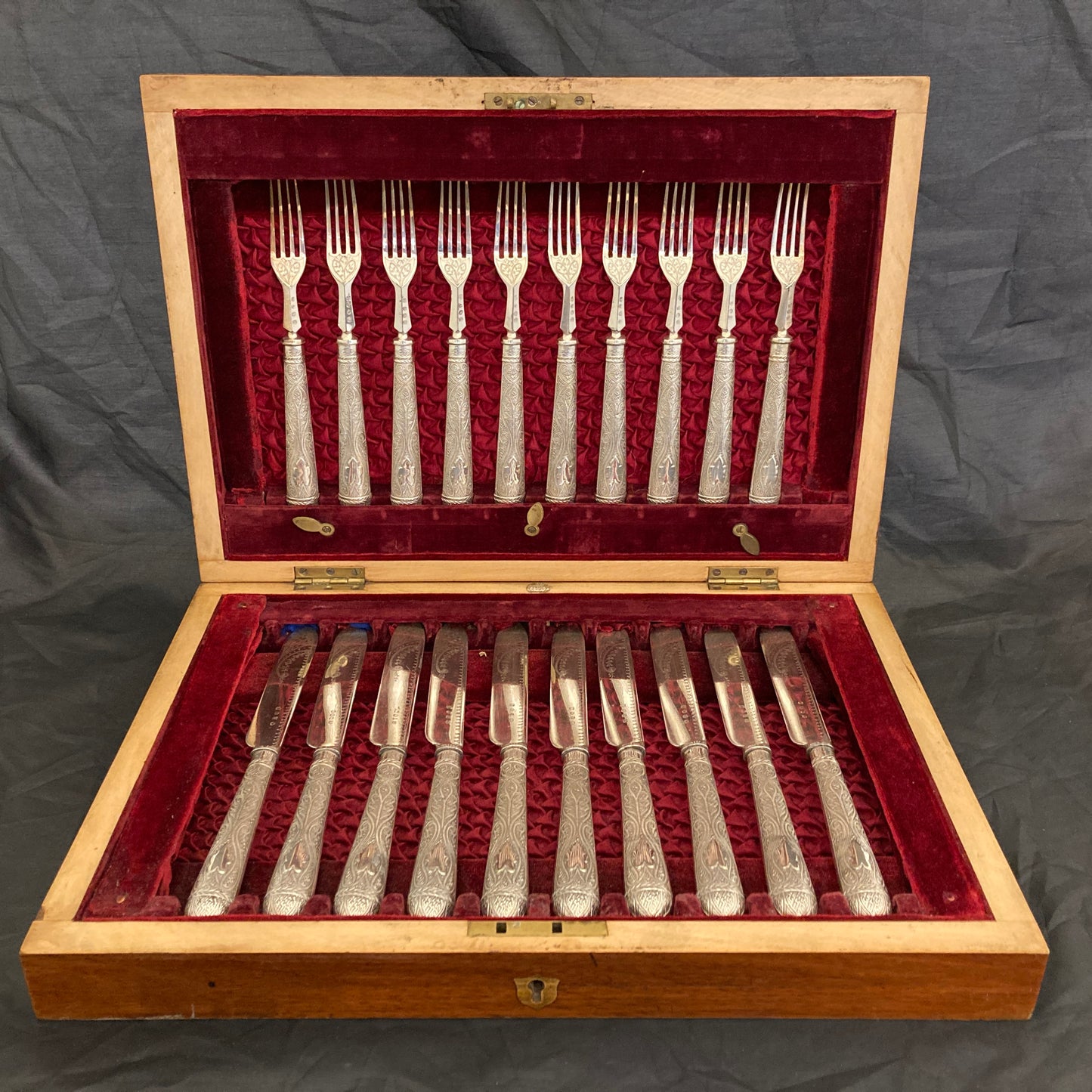 A boxed silver plated 12 place set