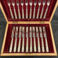A boxed silver plated 12 place set
