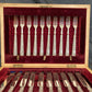 A boxed silver plated 12 place set