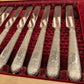 A boxed silver plated 12 place set
