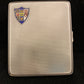 Antique sterling cigarette case with enamel shield