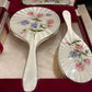 Hand painted silver and enamel boxed dressing table set