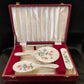 Hand painted silver and enamel boxed dressing table set