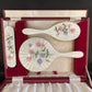 Hand painted silver and enamel boxed dressing table set