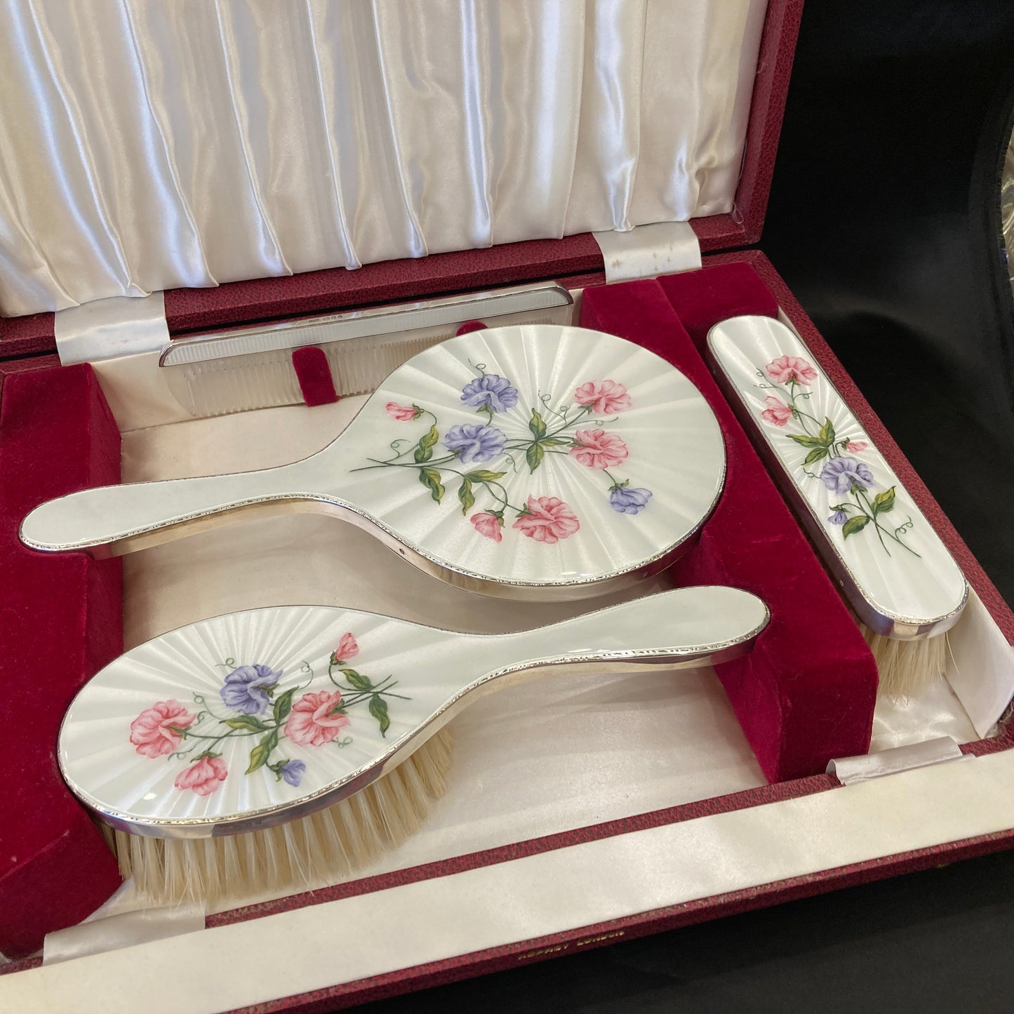 Hand painted silver and enamel boxed dressing table set