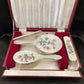 Hand painted silver and enamel boxed dressing table set