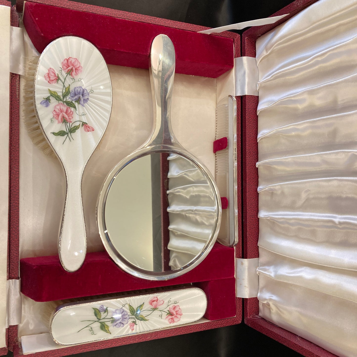 Hand painted silver and enamel boxed dressing table set