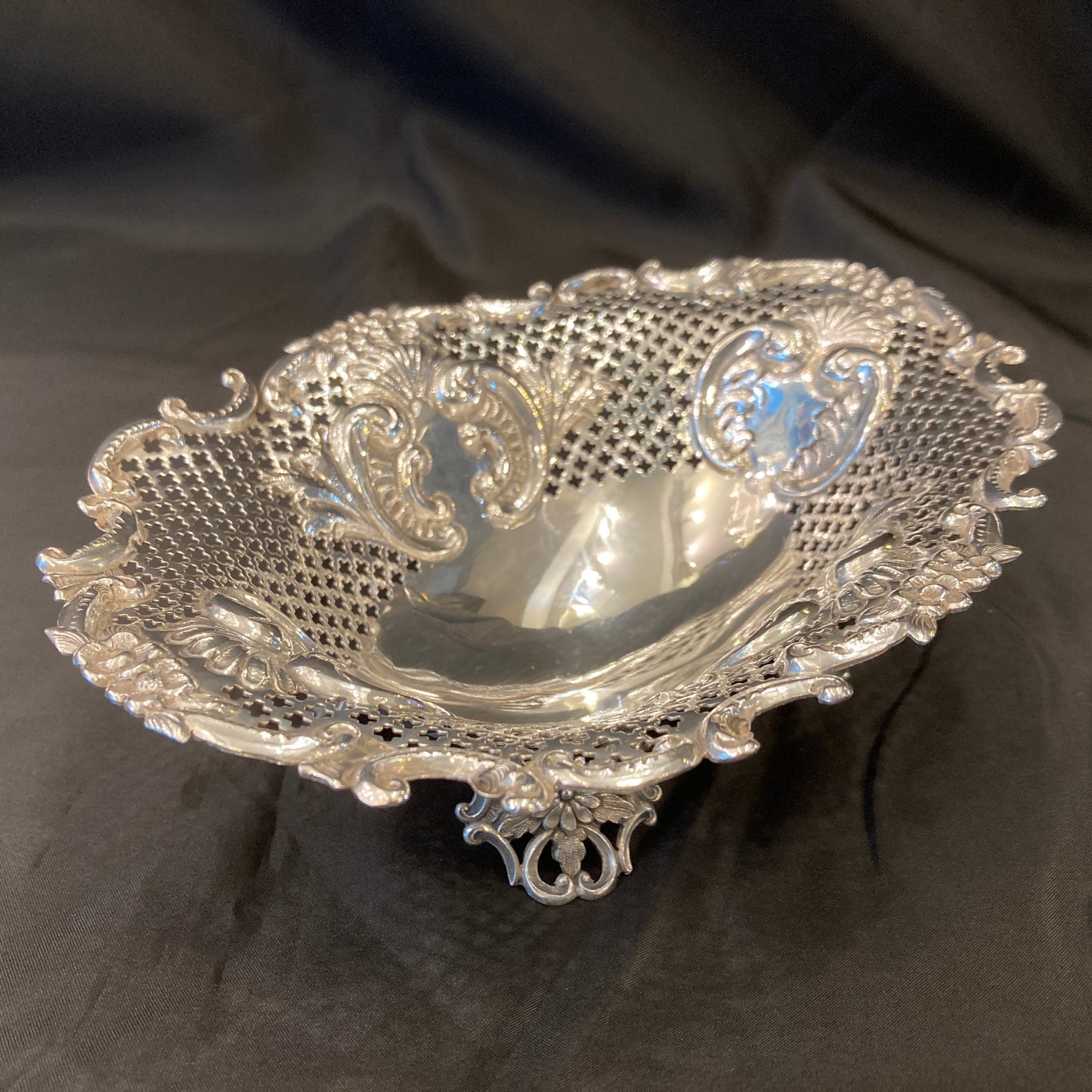 An Antique pair of pierced silver bonbon dishes