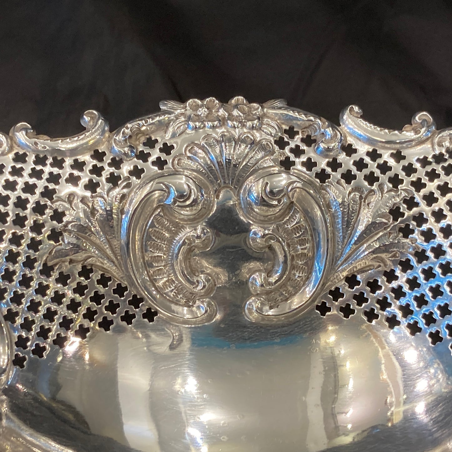 An Antique pair of pierced silver bonbon dishes