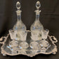 Antique silver plated drinks tray with cut crystal bottles and glasses