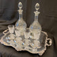 Antique silver plated drinks tray with cut crystal bottles and glasses